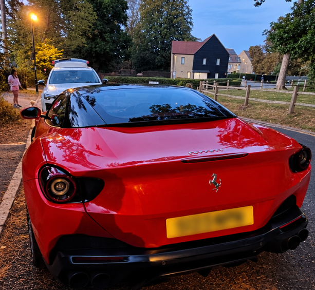 Detailed red Ferrari rear with polished paintwork